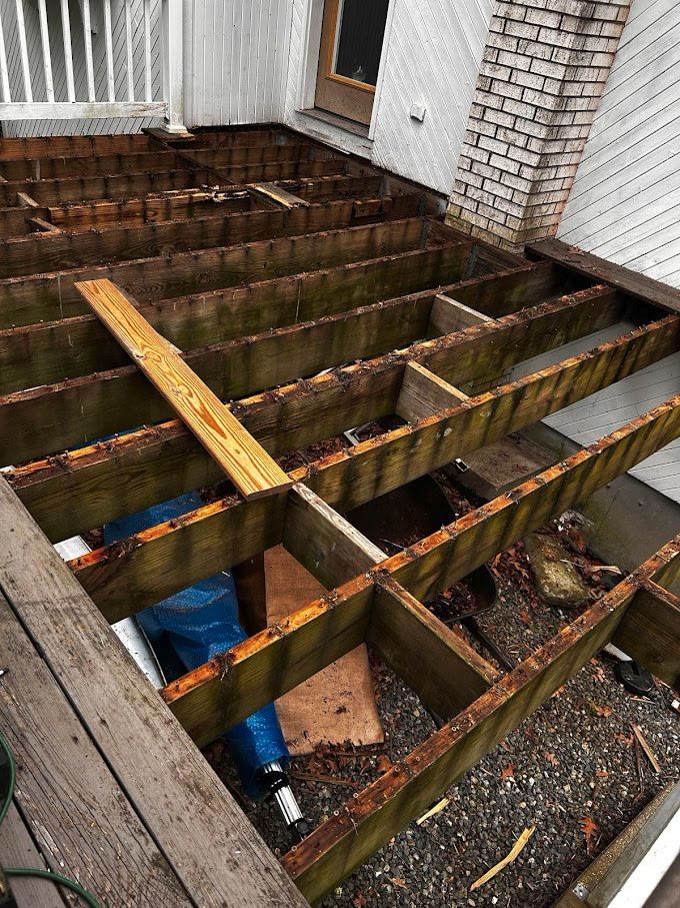 Rhode Island deck repair with surface boards removed and joists exposed